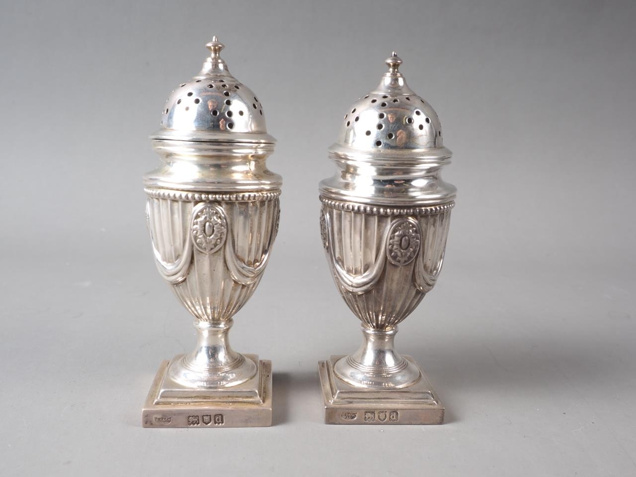 A pair of Adam style silver pedestal pepper shakers, in fitted case, 4.6oz troy approx - Image 2 of 3