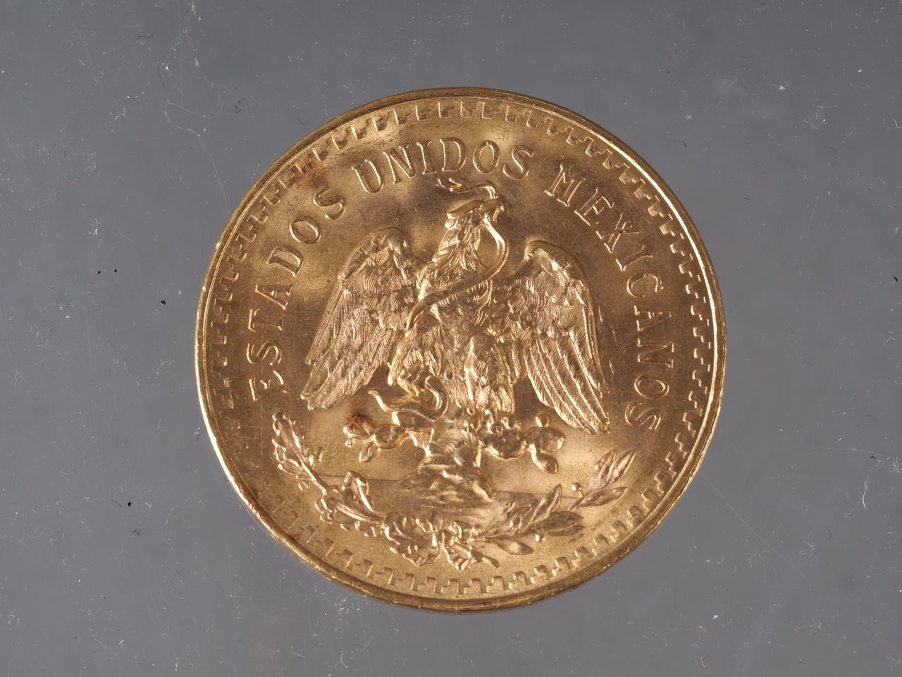 A Mexican 50 pesos gold coin, 125 year anniversary, 41.8g