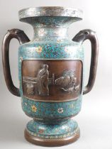 A Chinese cloisonne enamel two-handle vase with figure and bird decorated panels, 18" high (some
