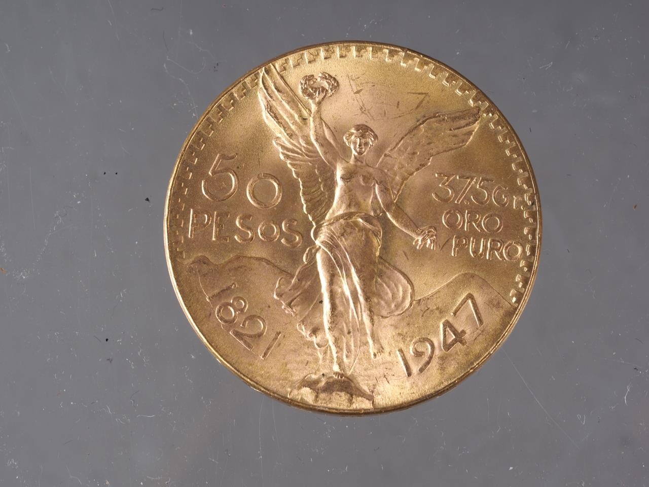 A Mexican 50 pesos gold coin, 125 year anniversary, 41.8g - Image 2 of 2