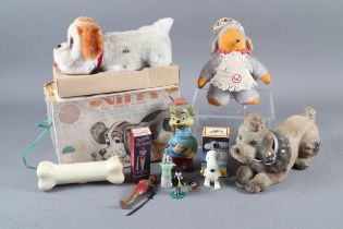 A Sniffy "The Nosey Puppy" toy in box, a Womble soft toy, a Fairylite "Falbala" the mystical and
