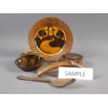 An antique Japanese lacquered shaped box with landscape decoration, 4" wide, a slipware dish with
