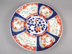 A pair of Japanese Imari lobed bowls of traditional design, 10" dia, and an Imari charger with