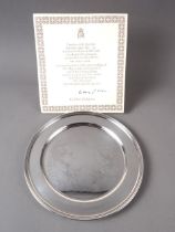A Pietro Annigoni limited edition Queen Elizabeth II silver wedding anniversary commemorative silver