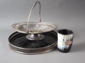A horn beaker with silver cartouche, 3 3/4" high, a silver plated gallery tray, 12" dia, and a
