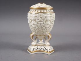 A Royal China Works Worcester Grainger & Co pot-pourri vase and cover with reticulated mask and