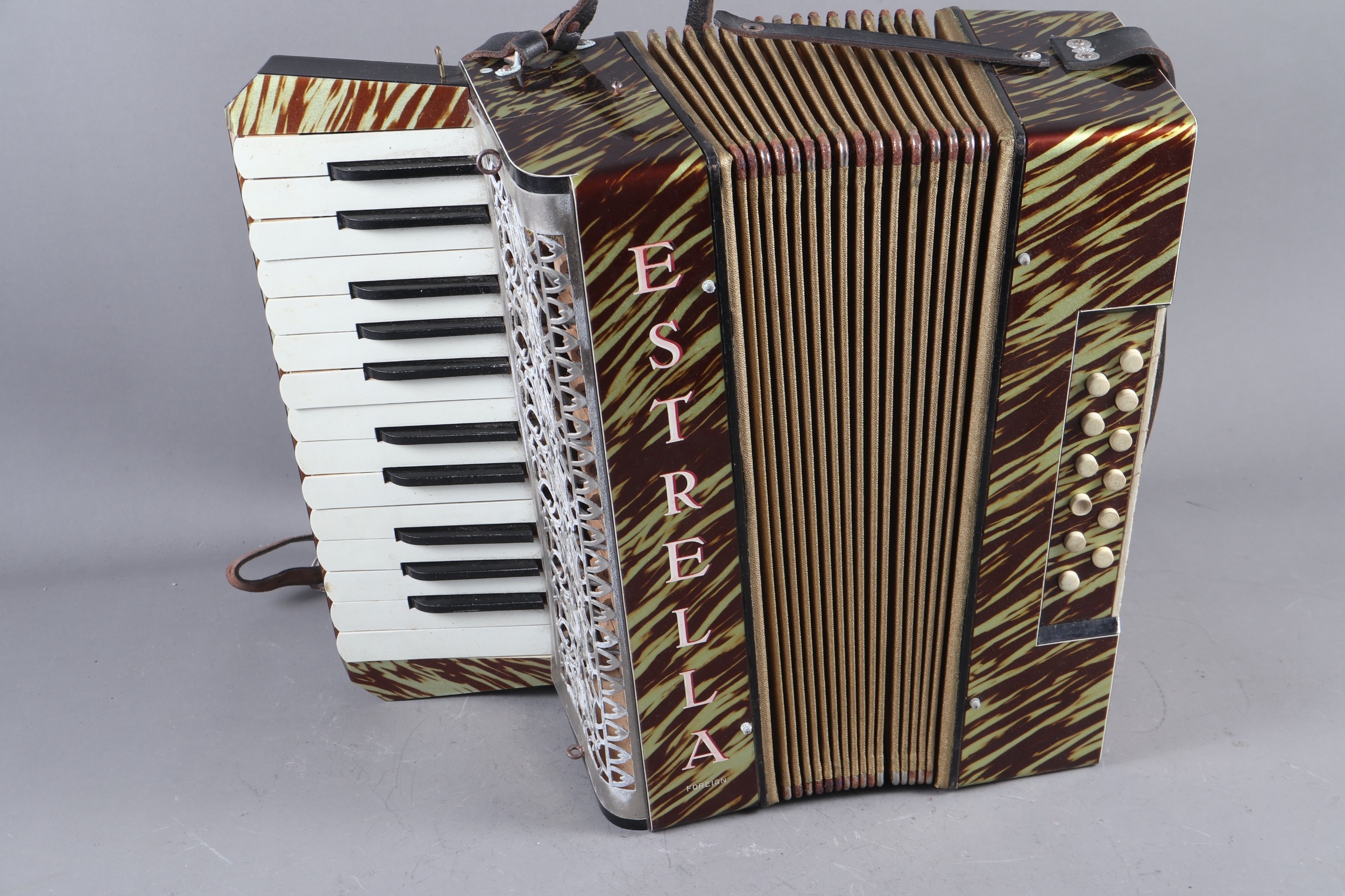 An HMV record player, an Estrella accordion, in case, a Melody-like banjolele (needs re- - Image 2 of 3