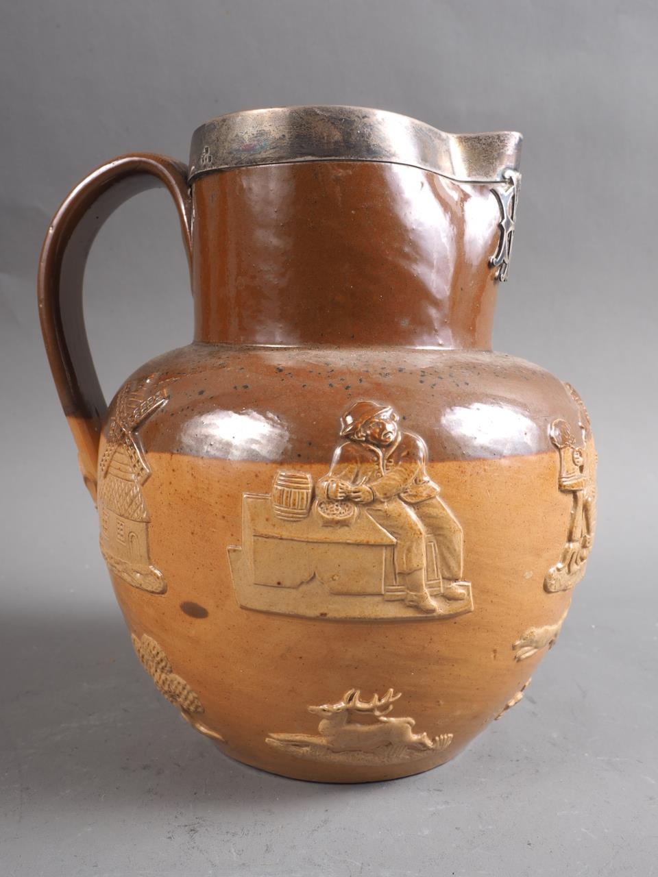 A Doulton Lambeth sprig decorated hunting jug with silver mount, 7" high, and a white glazed campana - Image 2 of 6