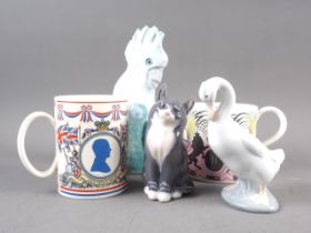 A Wedgwood 1953 commemorative mug, designed by Eric Ravilious, a Royal Copenhagen model of a cat,