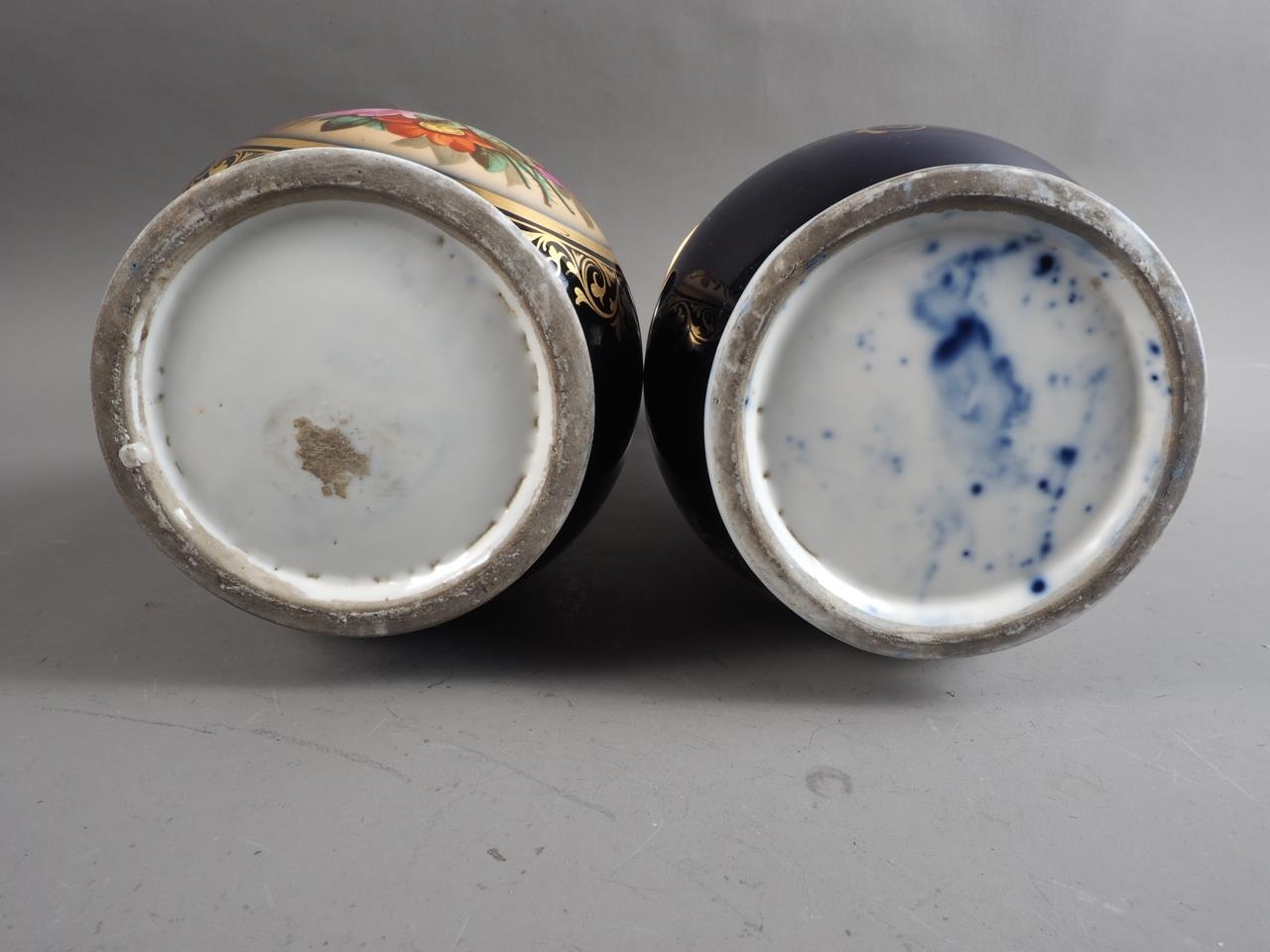 A pair of early 19th century bone china vases with flared rims and floral reserve panels on a blue - Image 6 of 16