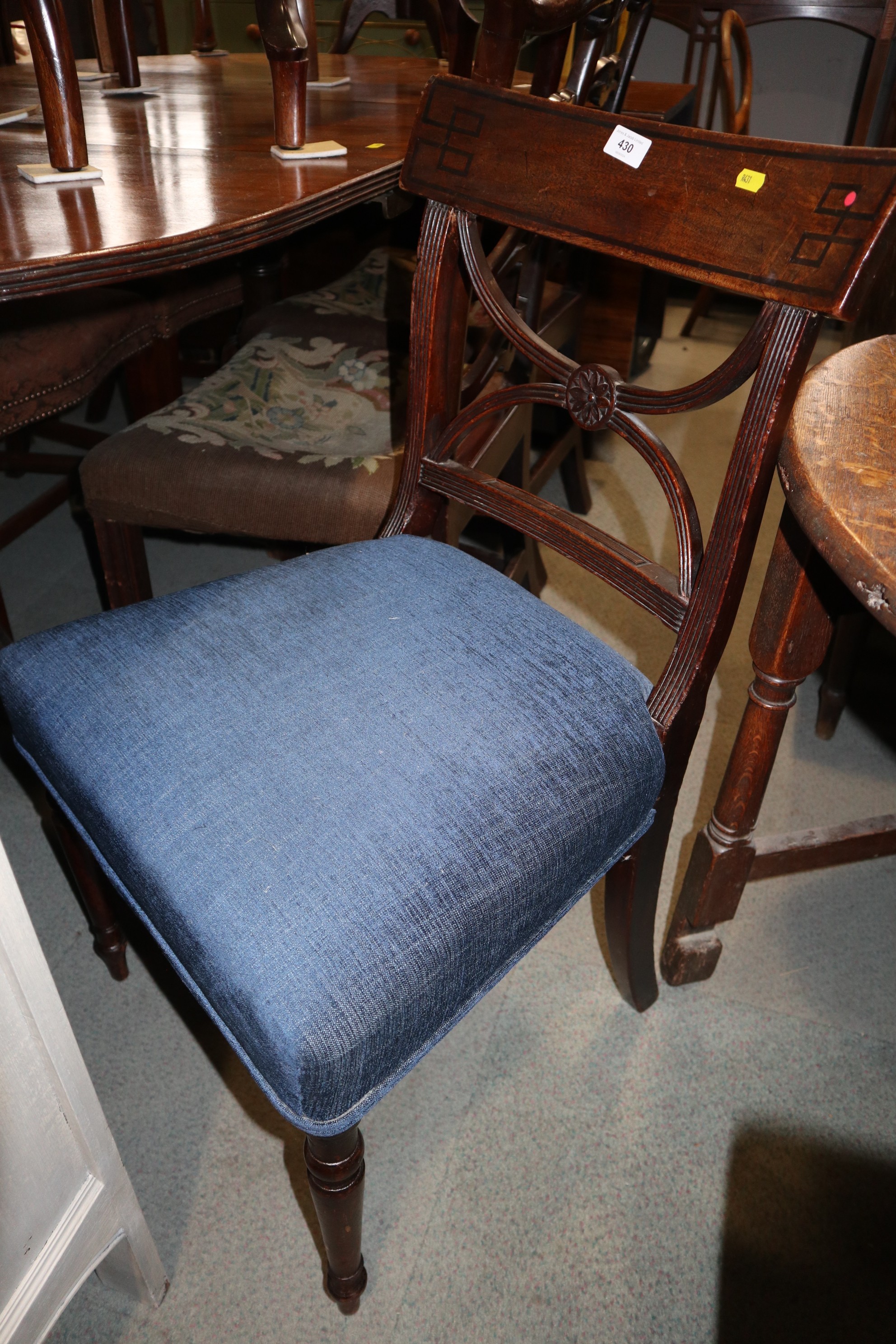 A pair of William IV mahogany and ebony line inlaid reeded frame 'X' bar back dining chairs, on