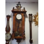 An early 20th century Vienna type wall clock with eight-day striking movement, in walnut case with