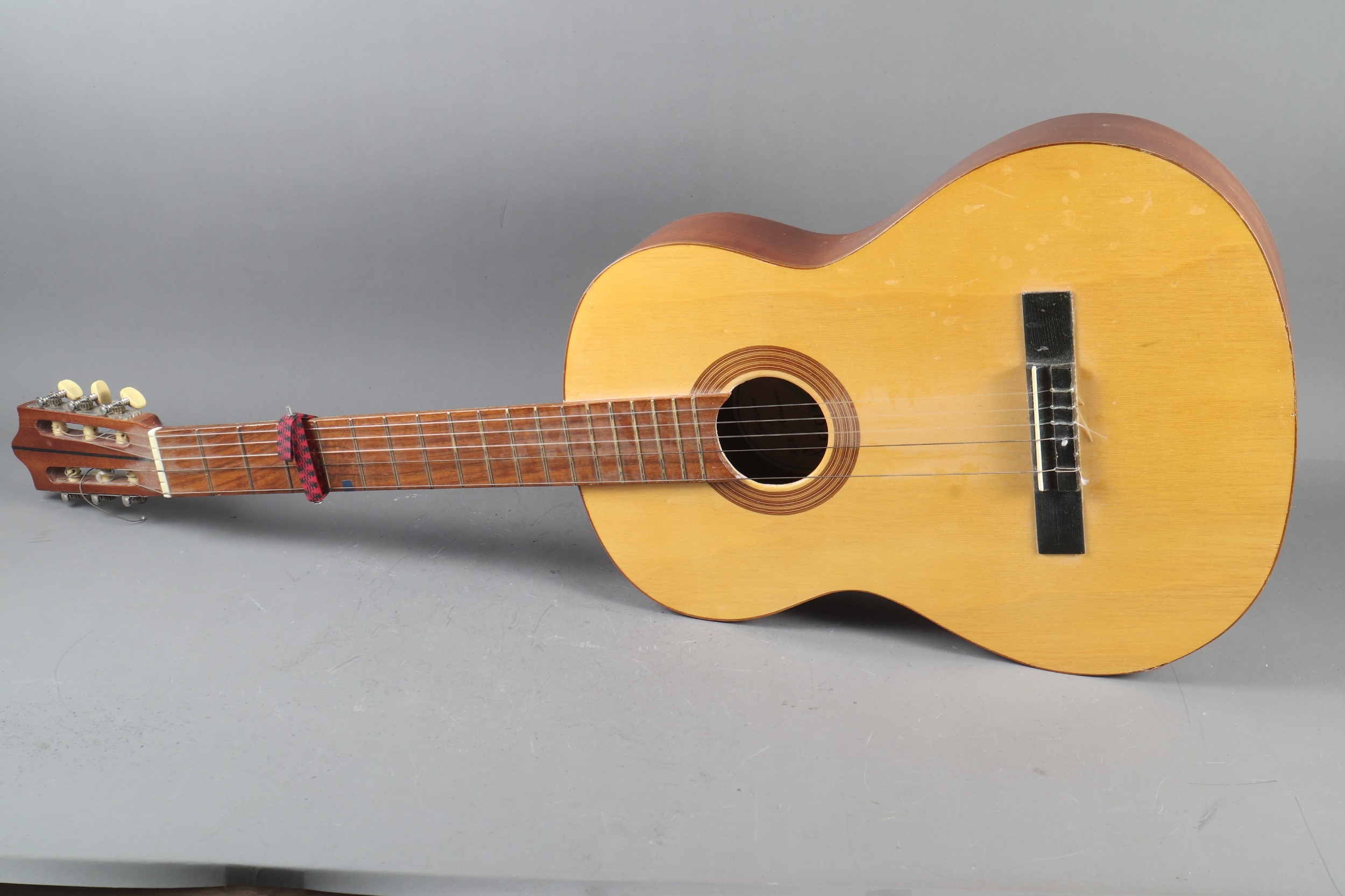A Spanish guitar, in carry case
