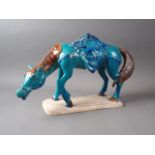 A "Tang" style horse with turquoise glazed body, 9 1/2" high