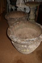 A pair of cast stone planters with swag decoration, 30" dia x 23" high