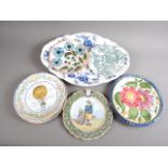 Two French faience plates, ballooning and fisher folk, and other decorative plates (chips to one