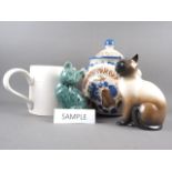 A giant pottery tankard, 7 1/2" high, a rumtopf, two ceramic cats and other ceramics