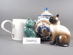 A giant pottery tankard, 7 1/2" high, a rumtopf, two ceramic cats and other ceramics