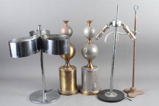 A matched pair of brass and steel bulbous table lamps, on cylindrical and circular bases, 16 3/4"