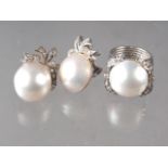 A pair of white metal, rose diamond and blister half pearl set ear clips and a matching dress rings,