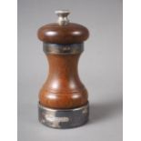 A mahogany and silver mounted "Peter Piper" pepper grinder, 4" high