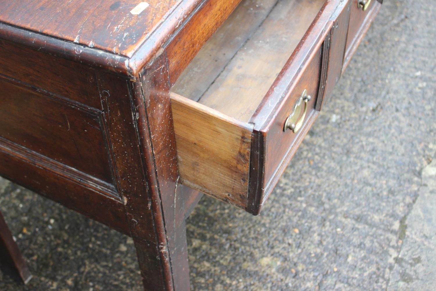 An 18th century fruitwood dresser base, fitted one short and two long fielded panel front drawers, - Image 2 of 12