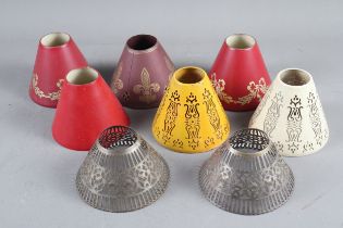 A group of painted, pierced metal, conical lamp shades, various, 3" high