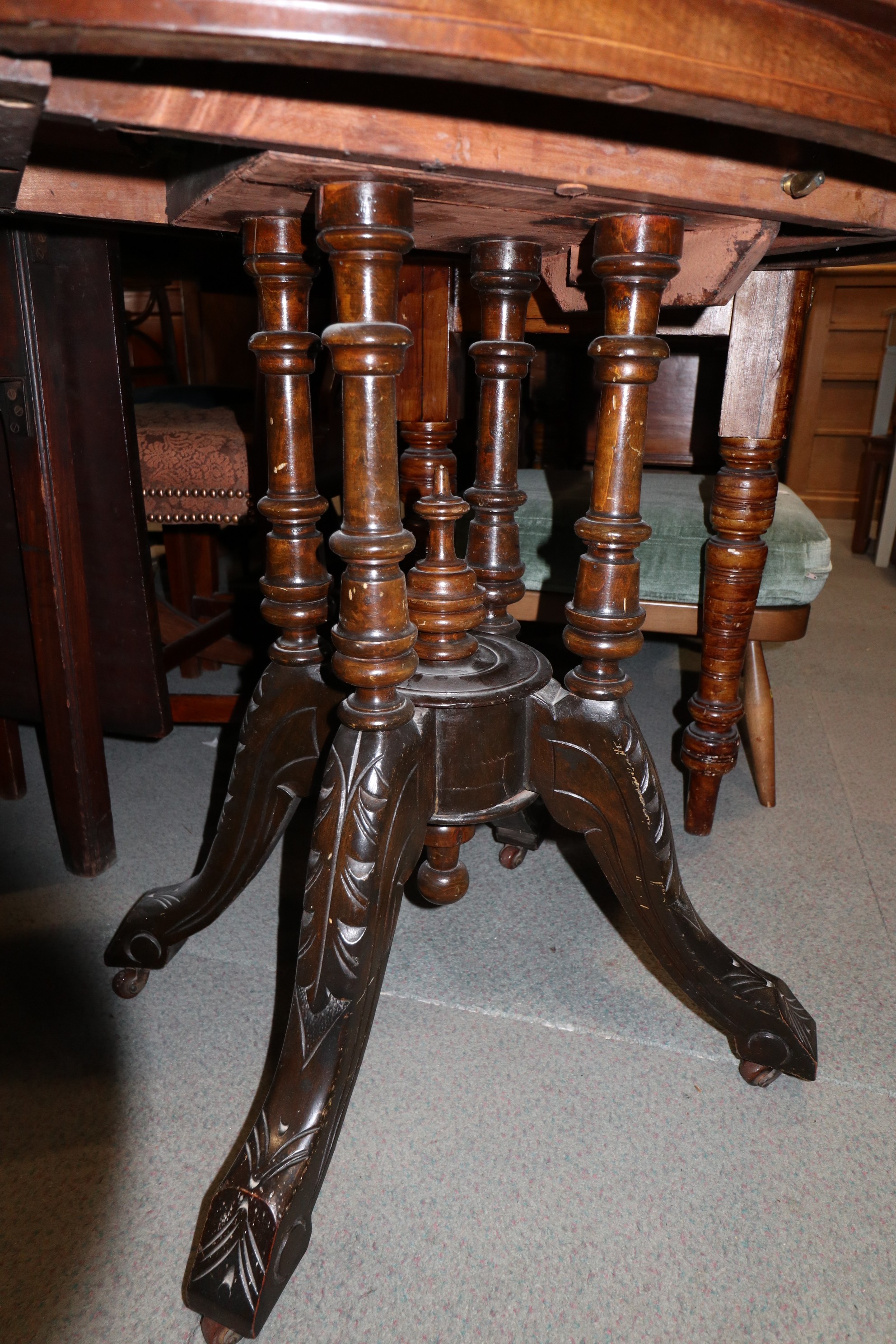 A 19th century walnut and inlaid tilt top occasional table, on quadruple turned splay supports, - Image 2 of 3