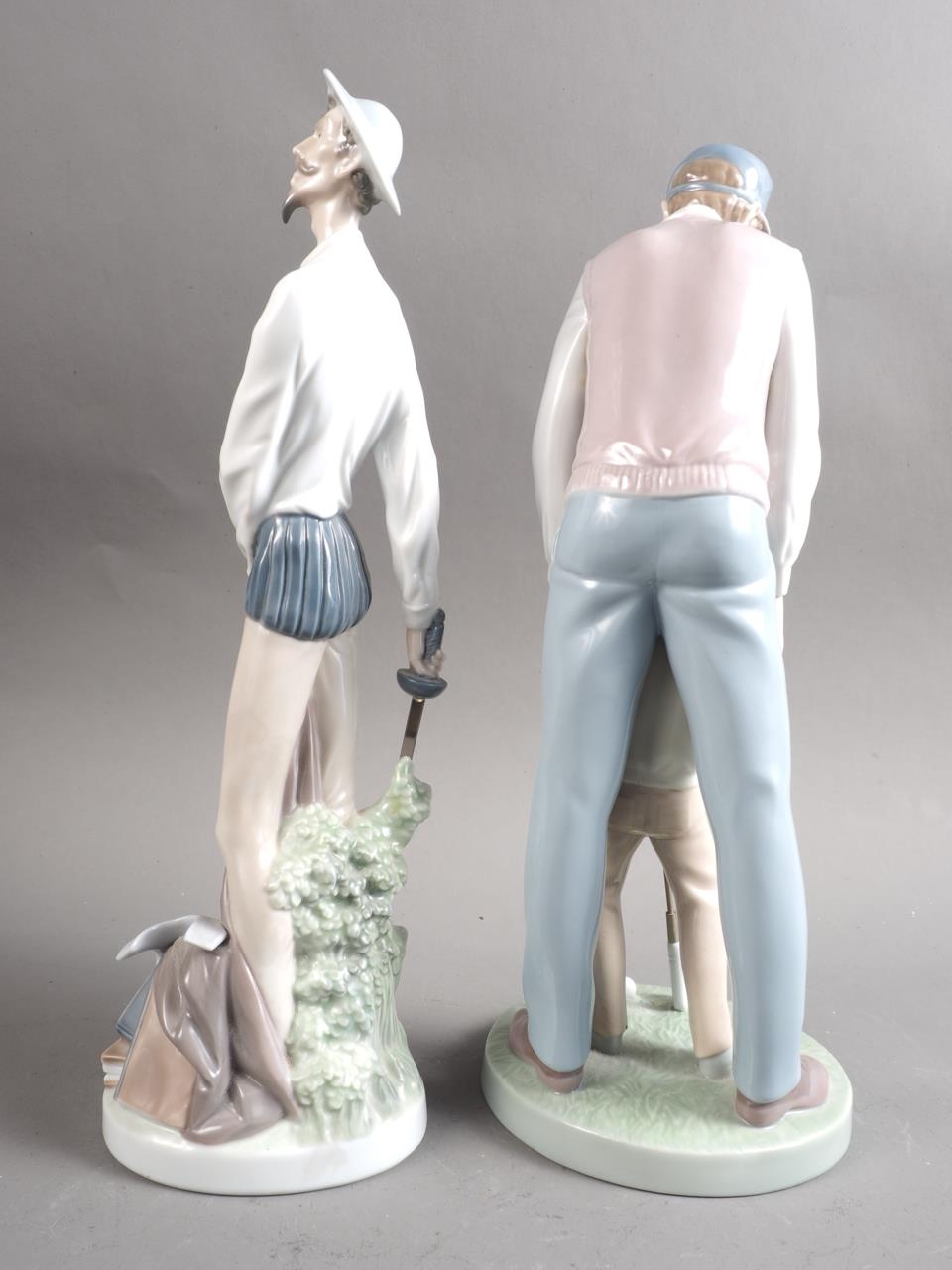 A Lladro figure of Don Quixote, 11 1/2" high, and a companion group, young golfer with father, 12" - Image 2 of 5