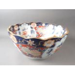 An Imari deep bowl/jardiniere with flower decoration and gilt border, 18" dia