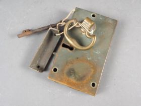 A Georgian brass door lock and key, 5 7/8" wide