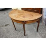A 19th century mahogany semicircular side table, on square taper supports, 46" wide x 24" deep x 28"