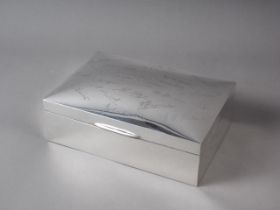 A rectangular silver cigarette box, presented to Commander J C J Soutter RN HMAS Platypus 1-9-24