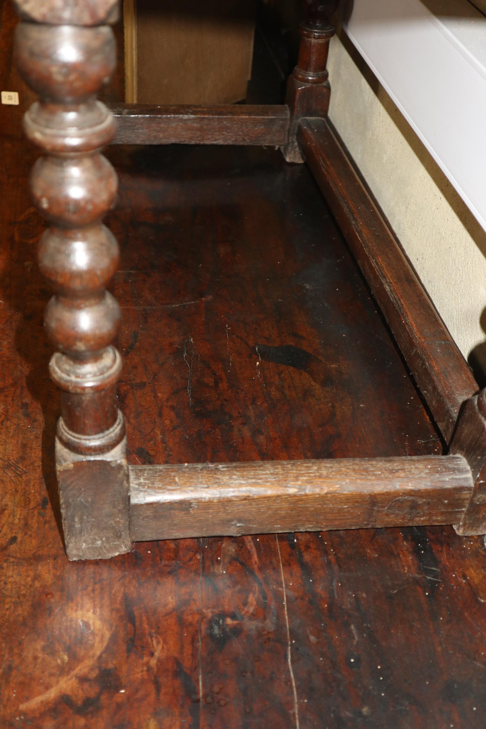 An 18th century fruitwood dresser base, fitted one short and two long fielded panel front drawers, - Image 12 of 12