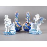 A pair of French porcelain figures of cherubs with column and altar, 7 3/4" high, and a pair of
