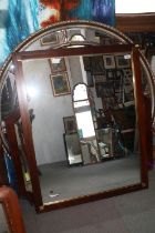 A rectangular oak and brass framed wall mirror, 26 1/2" x 34 3/4"
