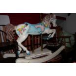 An American carved wood and painted galloper/rocking horse by S&S wood carvers, Santa Anna
