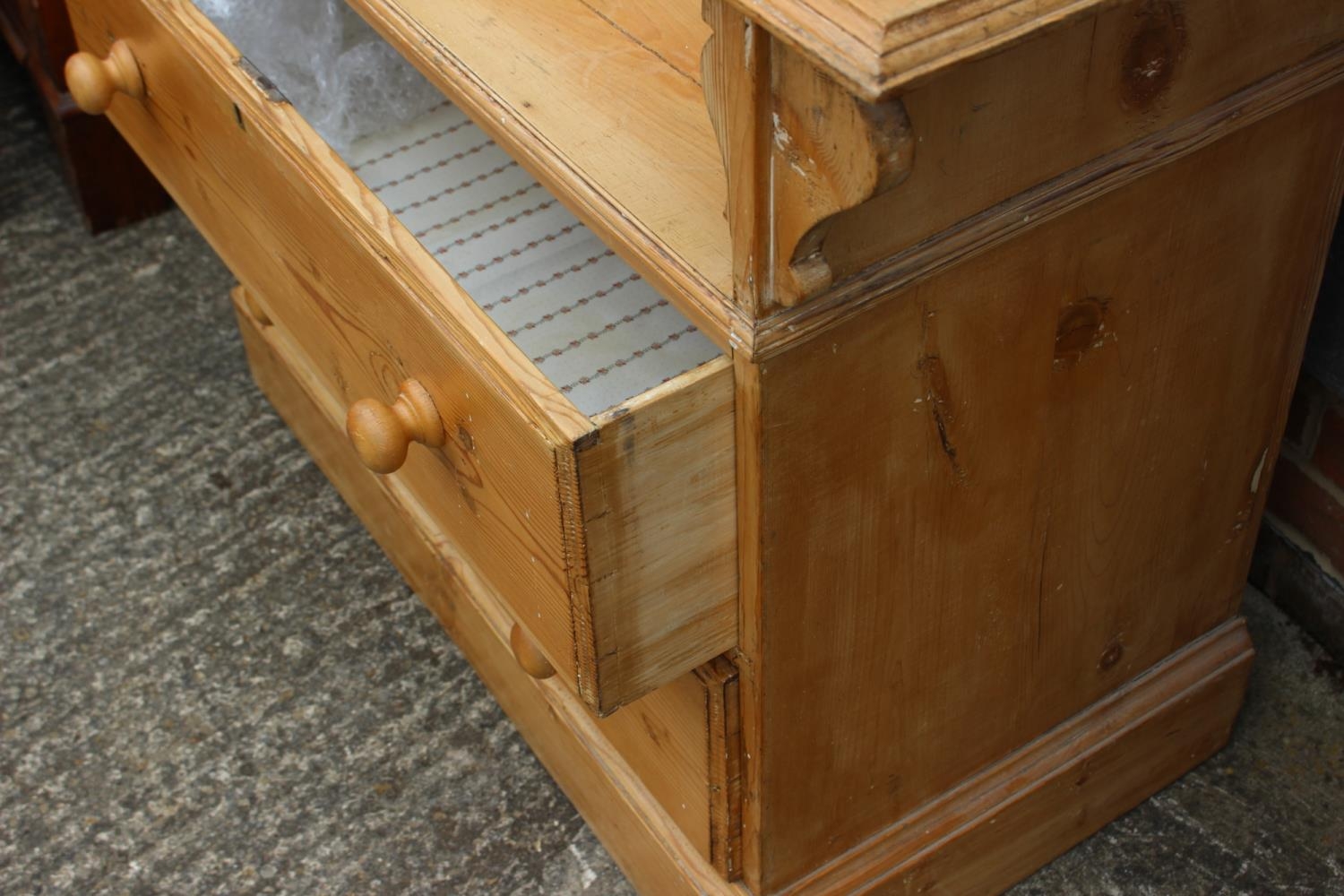 A waxed pine dressing chest, fitted mirror over shaped top, two drawers and two long drawers, on - Image 2 of 2