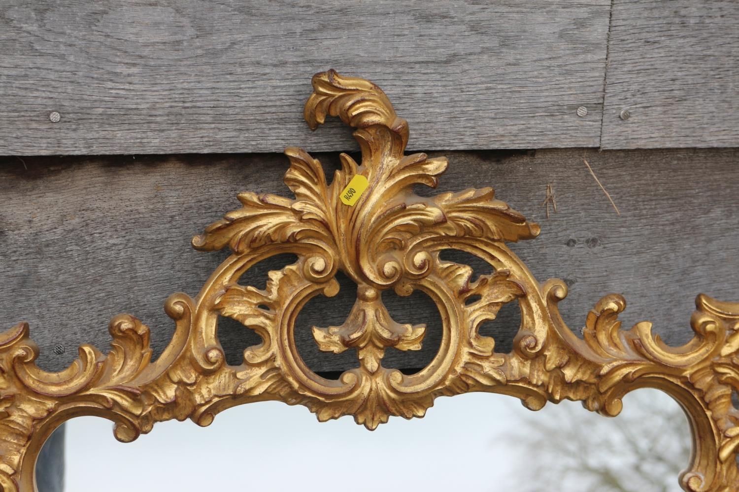 A carved giltwood framed wall mirror of Chippendale design with scroll crest, 42" x 25" overall - Image 2 of 2