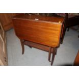 An Edwardian walnut and satinwood banded Sutherland tea table with pierced end supports, 24" wide