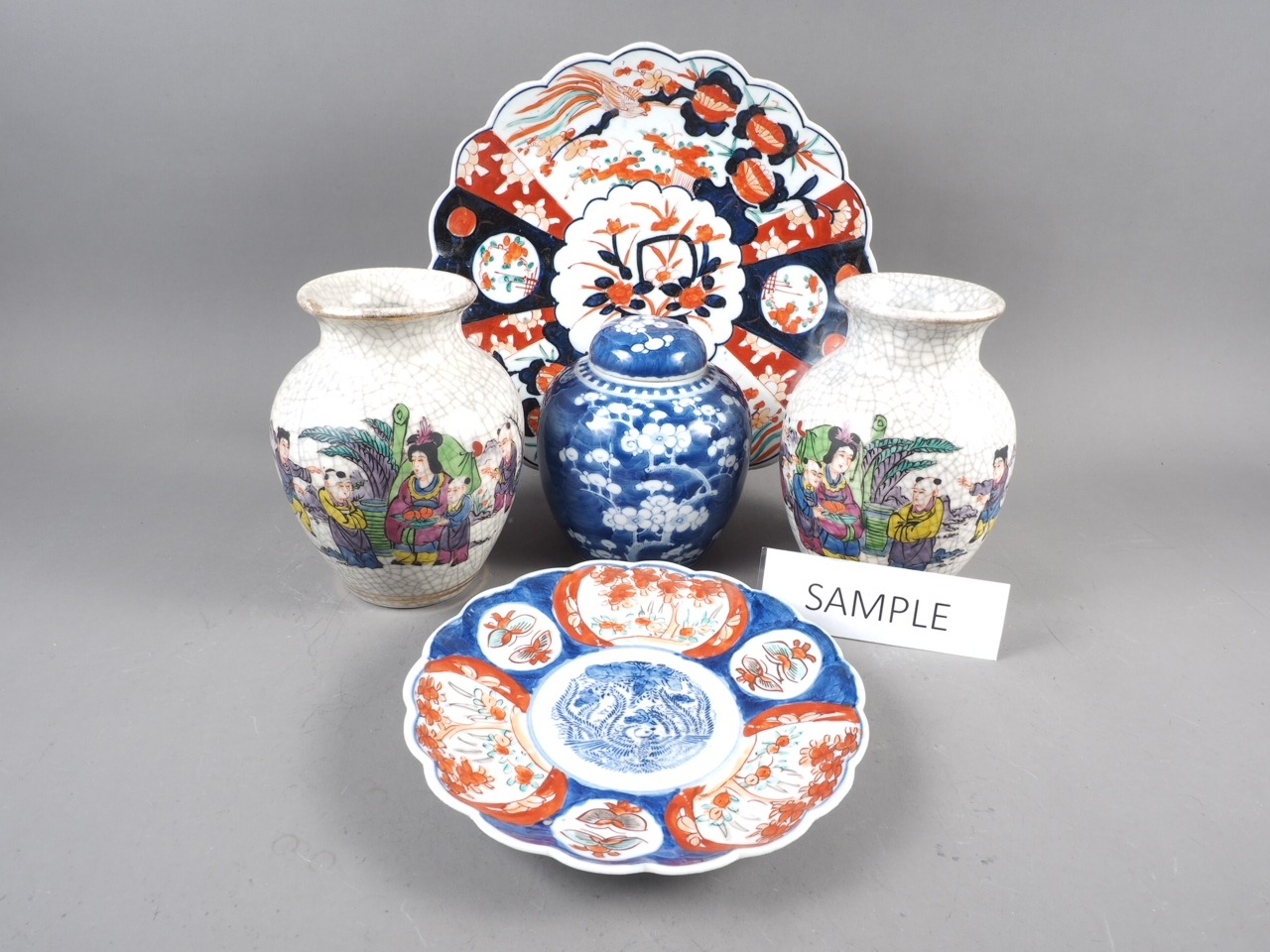 A pair of Chinese crackle ware vases with polychrome decoration, two Imari plates and other Oriental