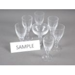 A set of seventeen port glasses with faceted stems and two matching glasses