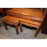 A nest of three Chinese hardwood occasional tables, largest 36" long x 18" deep x 18" high