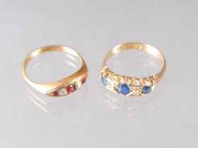 An 18ct gold, ruby and diamond five-stone ring, size N, and a similar 18ct gold, sapphire and