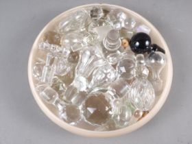 A quantity of clear glass decanter stoppers, various