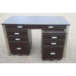 A John Lewis leather desk with brushed steel frame, 47" wide x 24" deep x 29" high, and a pair of