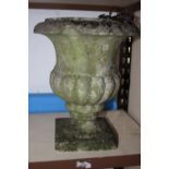 Two turned hardstone garden urns, on square bases, tallest 12" high, and one other (for repair)