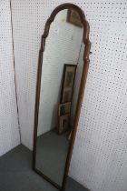 A walnut framed slip mirror of Queen Anne design, 52" high x 14 1/2" wide