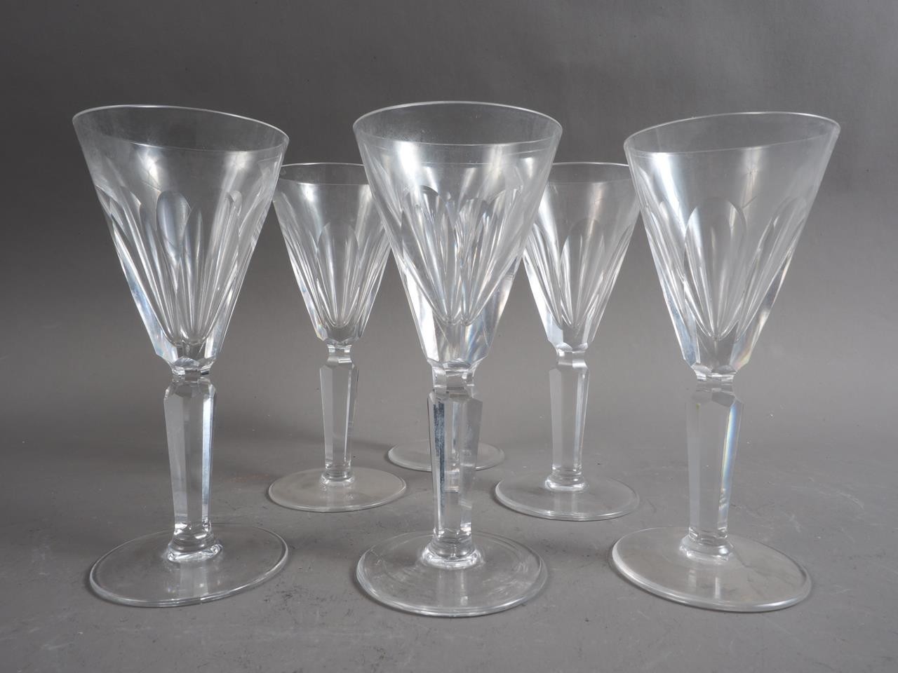A set of six Waterford port glasses with faceted stems, 5 1/2" high