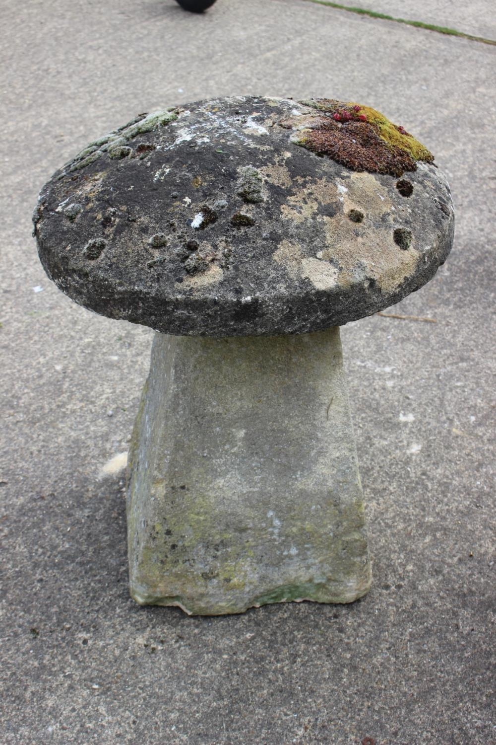 A sandstone staddle stone and cap, 22" dia x 27 1/2"